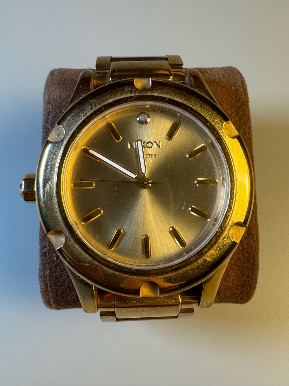 Nixon “High Maintenance” The Camden gold-tone watch w/ real diamond marker.